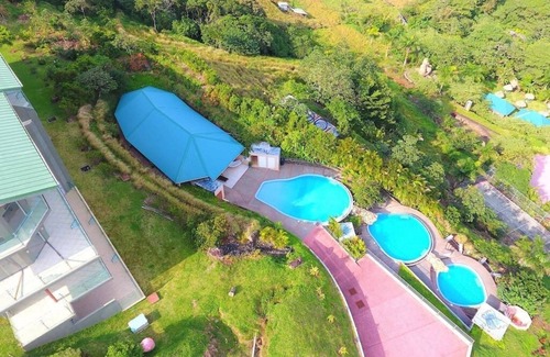 Naranjos Agrios Condo | On A Private Hillside Overlooking Pristine Lake Arenal
