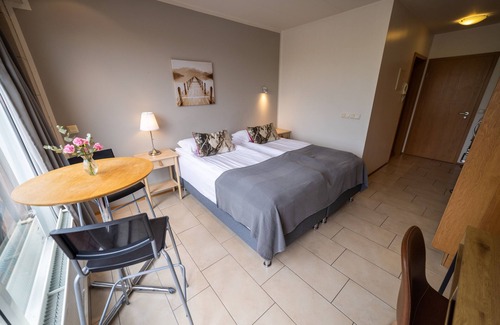 Hvalfjarðarsveit Hotel | On the countryside with a wonderful view all four seasons.