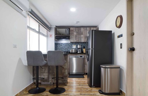 Medellin Apartment | One Bedroom Balcony AC hot tub apartment with part time security