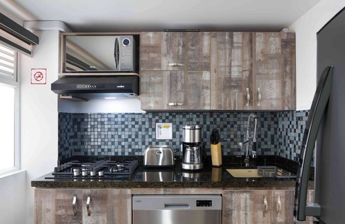 Medellin Apartment | One Bedroom Balcony AC hot tub apartment with part time security