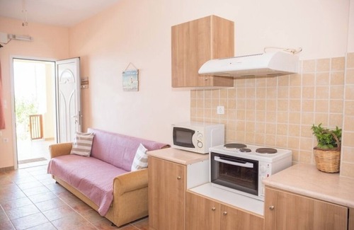 Thermisia Apartment | One-Bedroom Apartment with Sea Views and Olive Grove Serenity for Up to 3 Guests