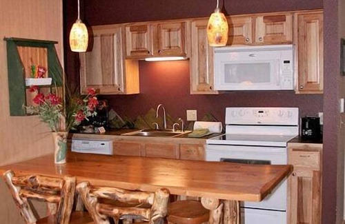 Estes Park Condo | One Bedroom, Two Bath Condo with a Personal Hot Tub on Deck Overlooking River