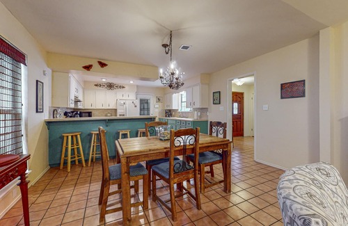 Laguna Vista House | One-level home with huge back yard, adjacent nature trail, & screened patio
