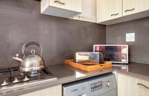 Sunset Beach Villa | One of the separate entrance apartment, inside Sunset Residence.