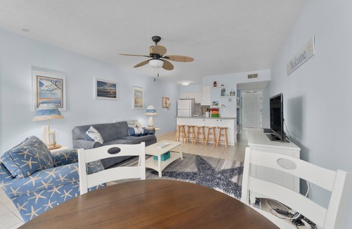 Duck Condo | Open and airy Colony by the Sea condo with beach-inspired décor and community amenities