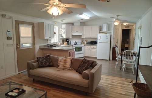 Sebastian House | Open and inviting home with screened in porch.