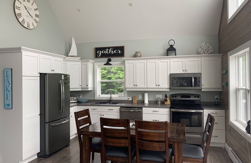 Boylston Cottage | Open and relaxing lake house, with hot tub and and firetable.