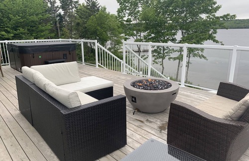 Boylston Cottage | Open and relaxing lake house, with hot tub and and firetable.