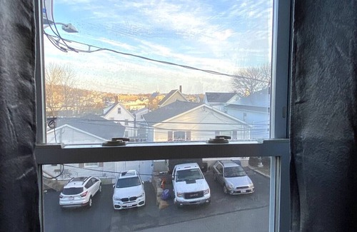 Gloucester Apartment | Open concept, 2-level apartment with scenic view