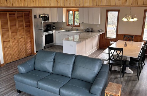 Colington Harbour House | Open Concept Home on Canal. Great for Boating Fishing Crabbing and Swimming.