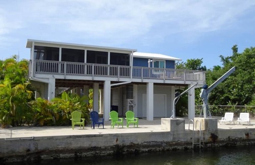 Port Pine Heights House | OPEN FOR 2025 LOBSTER SEASON! Nice 2-bedroom Canal Home in serene Big Pine Key!