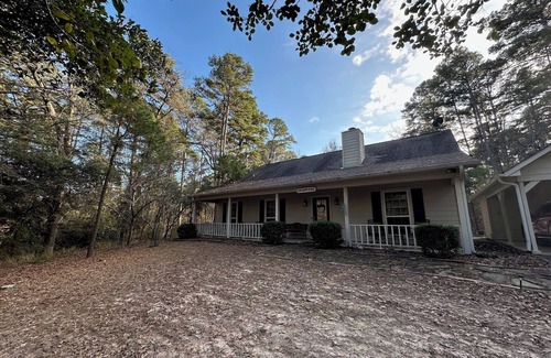 Holly Lake Ranch House | Our Happy Place is located in the gated community of Holly Lake Ranch.