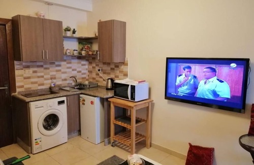 Amman Apartment | Overlooking balcony view next to Netherland embassy. Spacious furnished studio.