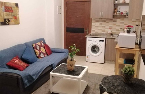 Amman Apartment | Overlooking balcony view next to Netherland embassy. Spacious furnished studio.