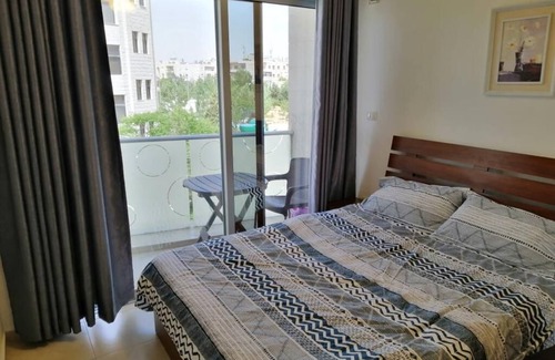 Amman Apartment | Overlooking balcony view next to Netherland embassy. Spacious furnished studio.