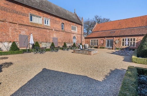 Brampton Cottage | Oxnead Hall is a breathtaking historic estate that blends grandeur with charm.