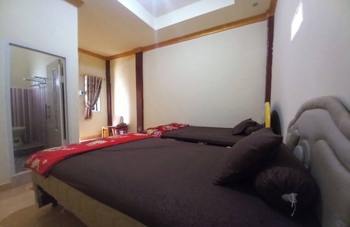Bailangu Hotel | OYO 90731 E-kreasi Home