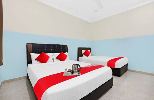 Gua Hotel | OYO 90873 Travellers Inn