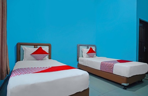 Kota Sidikalang Hotel | OYO 92577 Hotel Sidikalang Near KEJAKSAAN NEGERI DAIRI