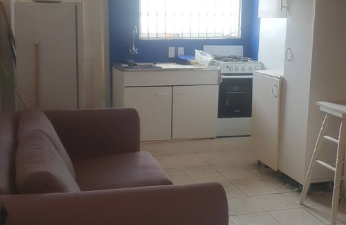 Marie Pampoen Apartment | PACCS APPT#1:Practical, Affordable, Clean, Central & Simple