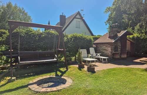 Lekowo House | Pack your bags and experience this idyllic holiday home with rowing boat.