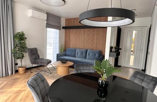 Palanga House | Palanga Waves Cottages in Kunigiskes