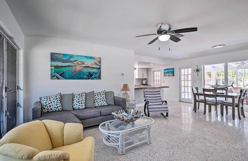 Palm City House | Palm City Canalfront Home w/Boat Dock & Fire Pit!