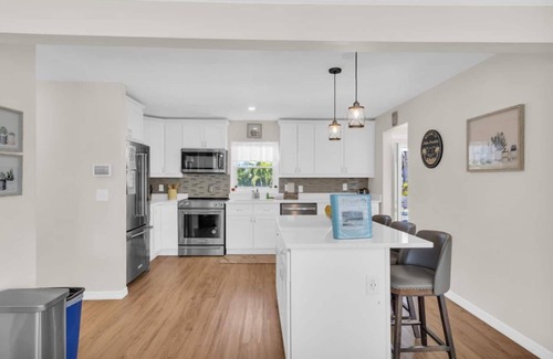 Sarasota Villa | Palm Paradise: Near Siesta Key Beach, Heated Salt Water Pool by Gulf Coast Holiday Homes