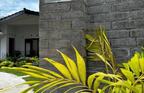 Kochchikade Apartment | Palmwood Cottages Double Bed Room with Kitchen
