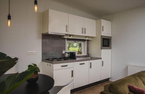 Municipality of Rijssen-Holten Ski Chalet | Panorama lodge with jacuzzi 2 p.