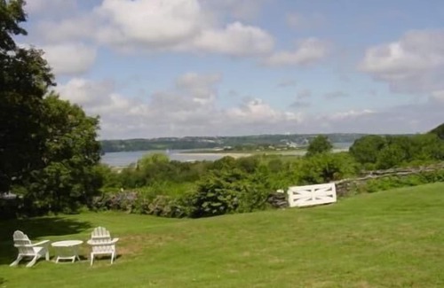 Tiverton House | Panoramic Ocean and River Views, Short Walk to the Shore.