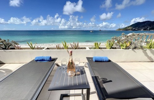 Grand Case Condo | Paradis Caraibes 1, feet in the water in Grand Case