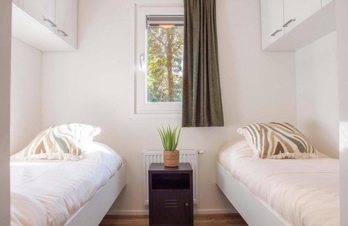 Ede Ski Chalet | ✓ Parel at Bospark Ede ✓ Holiday home for 4 people ✓ Located in Ede (Gelderland) ✓ Holiday resort in the Veluwe region ✓ Book directly at the resort
