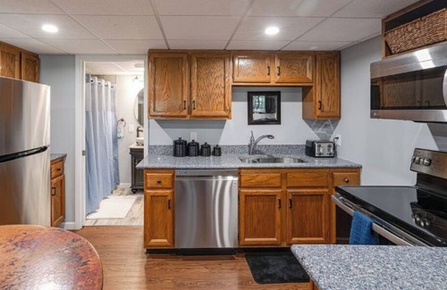 Lapeer House | Park in the Woods Cozy and clean. Shared Hot Tub