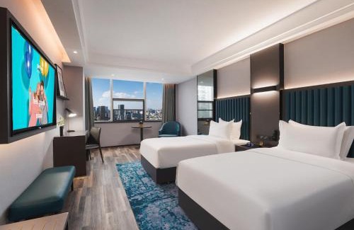 Hantai District Hotel | Park Inn by Radisson Hanzhong Central Square & High speed rail station