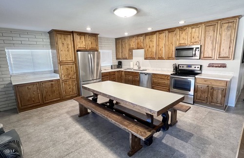 Moovalya Keys House | Parker Keys Waterfront Home with 50’ private dock, pool table and BBQ