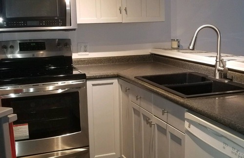 North Carolina Coast Condo | Partial ocean view. 6 min walk to beach. 1.5 baths: great beds, linens inc.