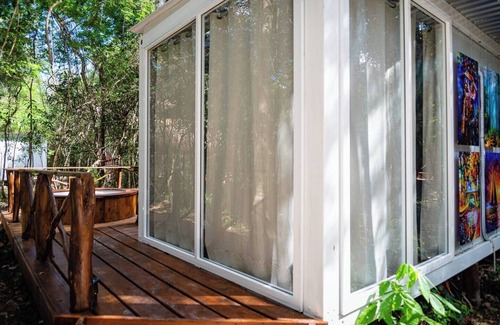 Akumal Cabin | Peaceful Getaway in the Jungle with AC and private deck with Hot Tub.