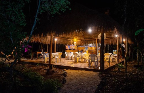 Akumal Cabin | Peaceful Getaway in the Jungle with AC and private deck with Hot Tub.