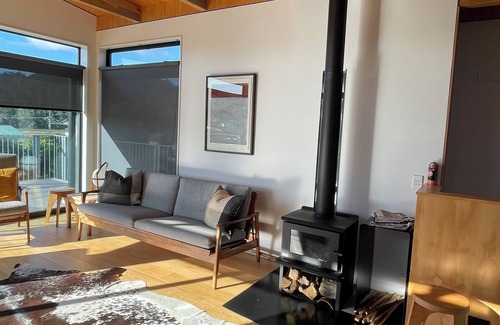 Matapouri House | Peaceful 4-Bedroom Beach House across road from estuary & fantastic beach views
