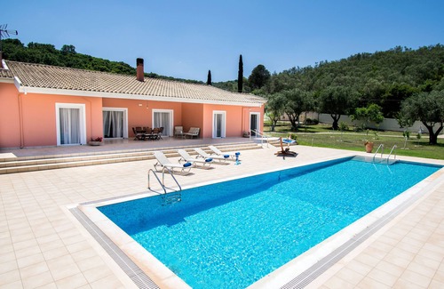 Petaleia Villa | Peaceful 9 guest villa with extra-large pool, just 1 min walk from the beach