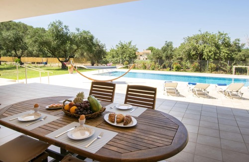 Petaleia Villa | Peaceful 9 guest villa with extra-large pool, just 1 min walk from the beach