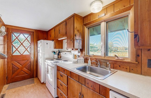 Owls Head Cabin | Peaceful coastal cabin with screened porch views of the cove, meadow, and sea