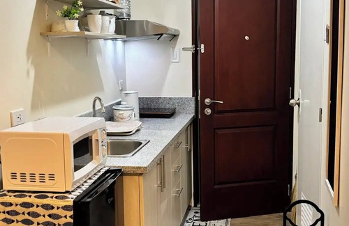 Silang Condo | Peaceful Condo with Pool along Tagaytay Road