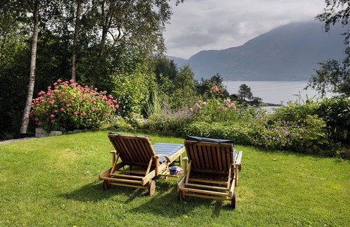 Glomset Apartment | Peaceful countryside apartment near Ålesund. Fjord & Mountain views & garden