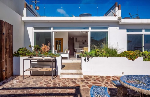 La Paloma Villa | Peaceful dog-friendly villa with outdoor pool, rooftop patio, beach views, & AC
