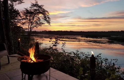 Spooner Cabin | Peaceful retreat on Yellow River. Kayak, canoe or explore our 20 wooded acres!