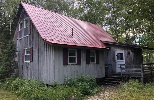 Rangeley Plantation Cabin | Peaceful, Secluded Waterfront Cottage with Sandy Beach