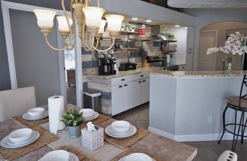 Laurel House | Peachland getaway with pool and tiki bar.
