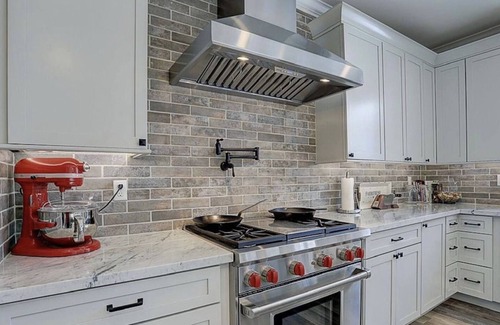 Meadow Lakes House | Peakside Retreat with Chefs Kitchen, Theater, Game, Kids Rooms by Design
